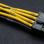 Close-up view of an 8-pin CPU power connector with color-coded wires